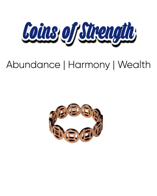An elegant gold ring featuring coin designs, embodying themes of wealth and abundance.