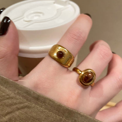Close-up of the Courage Power Tiger's Eye Gold Rings showcasing its unique design and rich, golden hues.