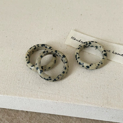Dotted Stone Ring: A trendy ring with dotted stone design, perfect for adding a unique touch.