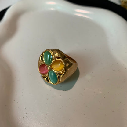 Close-up of the elegant golden ring with a cat's eye stone
