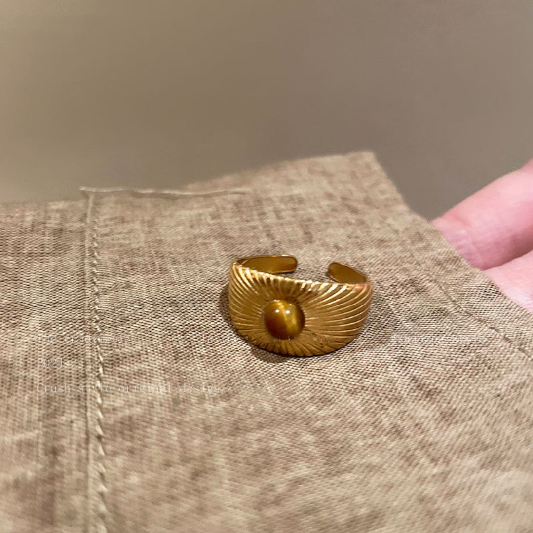 Elegant Courage Power Tiger's Eye Gold Ring designed with a chunky band and a vibrant tiger's eye stone, embodying strength and style.