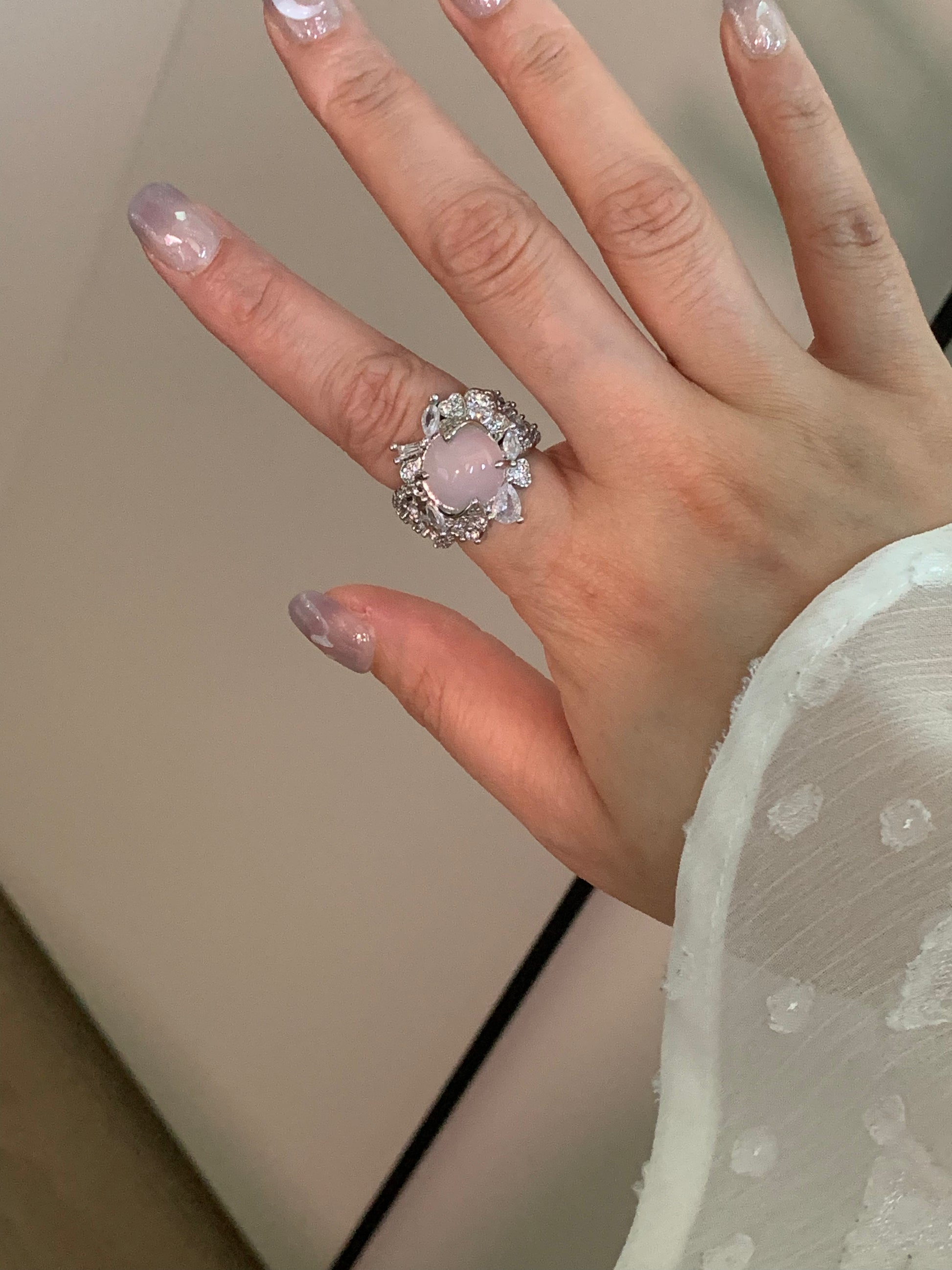 Elegant styling of the Spiritual Power White Jade Ring, ideal for thoughtful gifting on special occasions.
