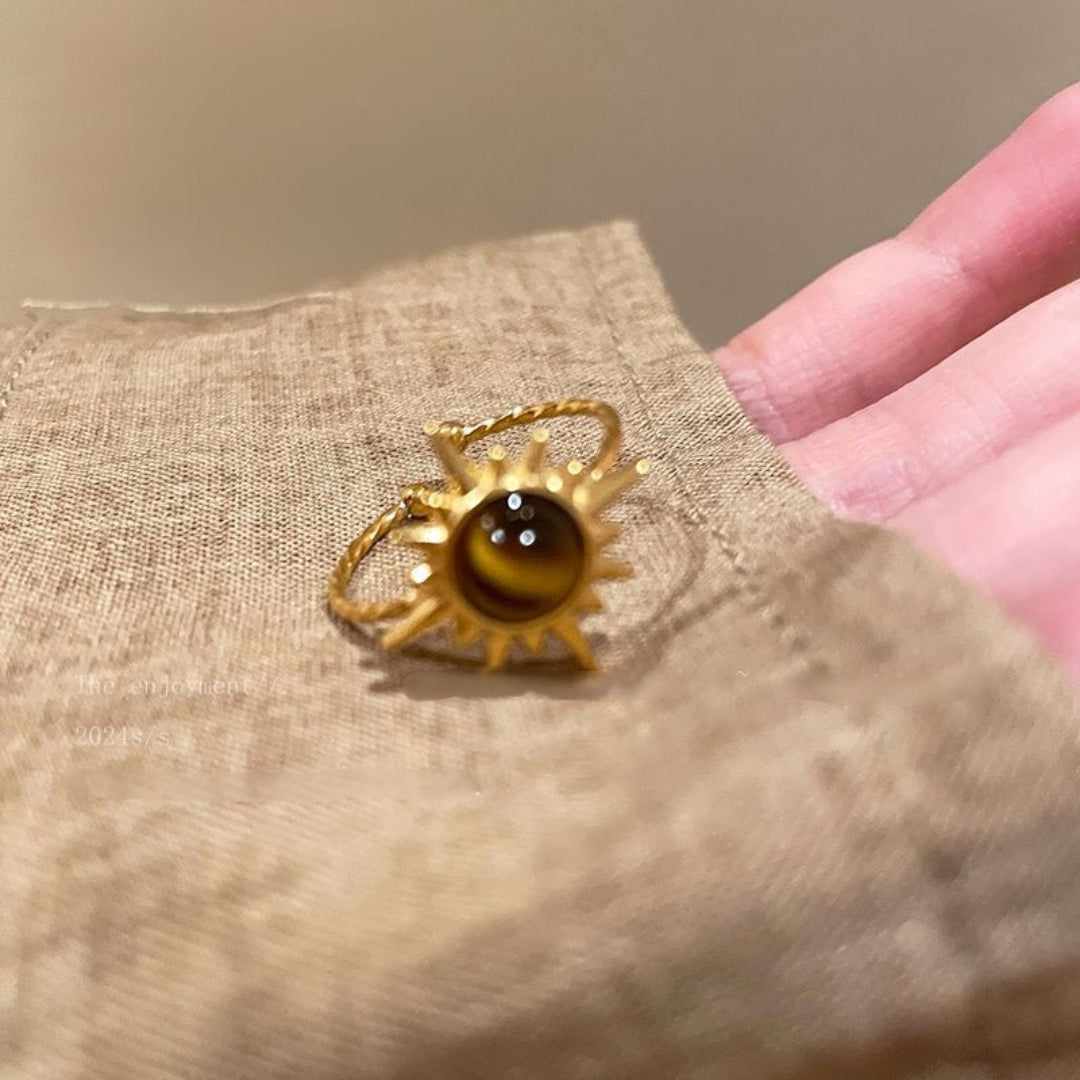 Stylish Courage Power Tiger's Eye Gold Ring with a bold tiger's eye centerpiece, perfect for adding a statement to any outfit.
