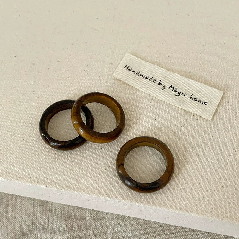 Tiger's Eye Ring: A bold ring made from tiger's eye, believed to provide strength and protection.