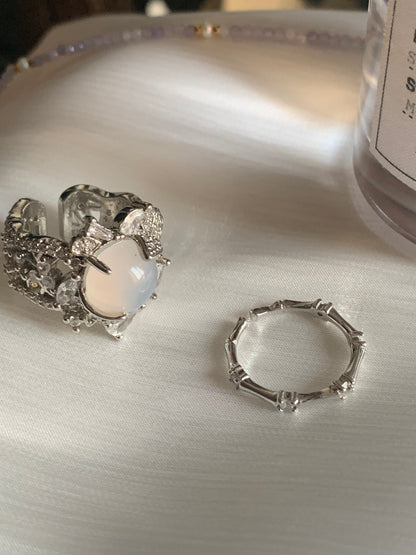 Close-up of a white jade ring, radiating spiritual energy and harmony.